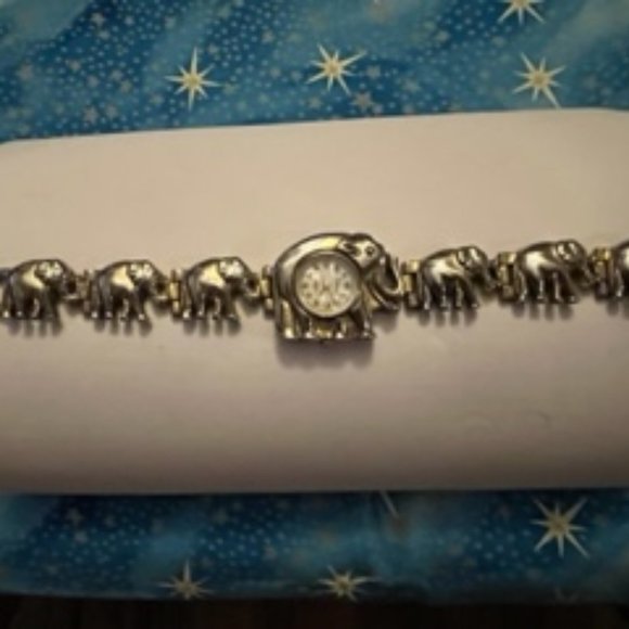 Elephants linked trunk to tail stainless steel watch, now a bracelet. - Picture 2 of 3